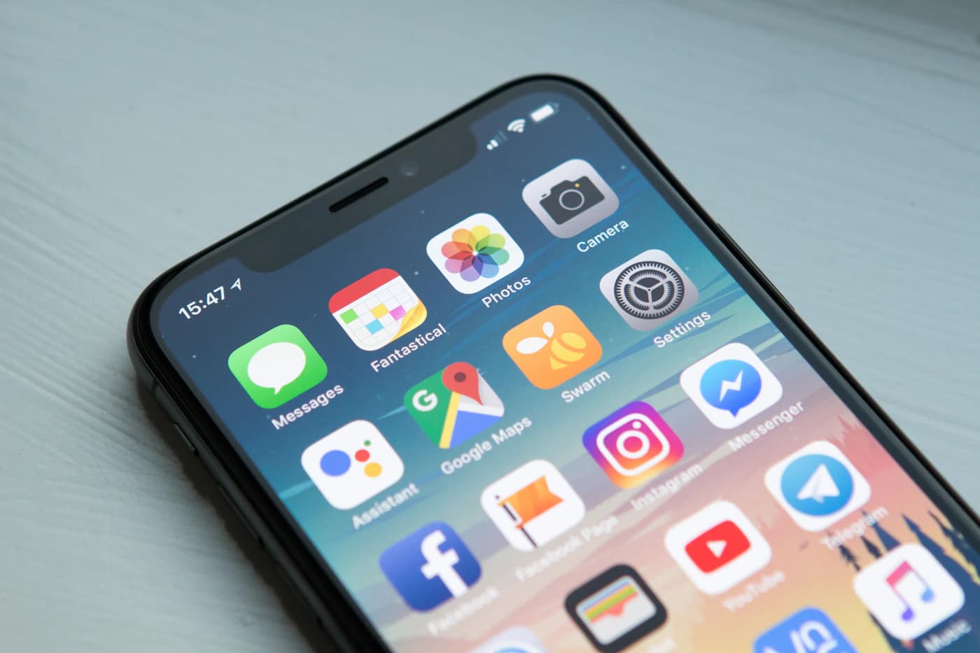 Two smartphones floating at an angle with blank glowing screens